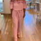 Off-the-shoulder ruffle jumpsuit | Relaxed and refined at the touch of a button